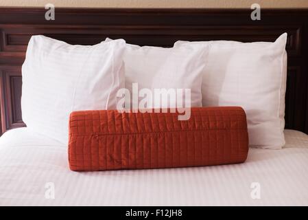 Comfortable Hotel Bed and and Three Pillow. Night in the Hotel Stock Photo