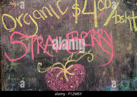 sign for organic strawberries, Farmers Market, Santa Barbara, California Stock Photo