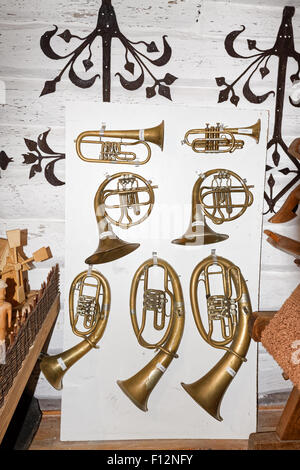 Traditional old brass instruments like trumpet, helicon, french horn on exibition in              folk museum in Markowa,Poland, Stock Photo