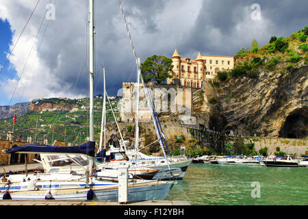 Italian holidays - Maiori in Amalfi coast, view with a castle and yachts Stock Photo