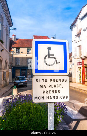 Handicapped parking waiting sign - France. Stock Photo