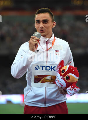 Beijing, China. 26th Aug, 2015. Silver medalist Poland's Adam Kszczot celebrates during the awarding ceremony of men's 800m at the 2015 IAAF World Championships at the 'Bird's Nest'National Stadium in Beijing, capital of China, Aug. 26, 2015. Credit:  Wang Haofei/Xinhua/Alamy Live News Stock Photo