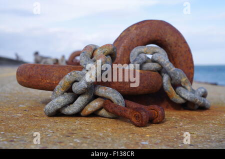 Old rusty chain corroded by sea water Stock Photo