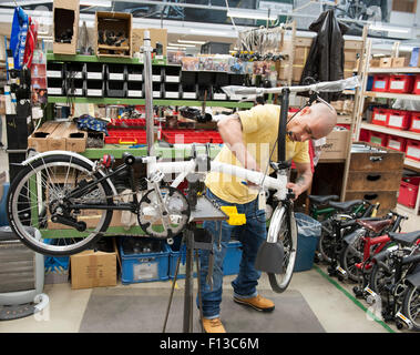 Assembling of a folding bike at Brompton Bicycle Factory in Brentford South West London England UK Europe Stock Photo