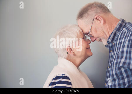 Portrait of a happy Senior couple face to face Stock Photo
