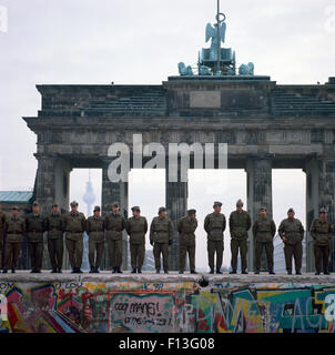 Berlin, Germany, GDR border guards on the wall in front of the Brandenburg Gate Stock Photo