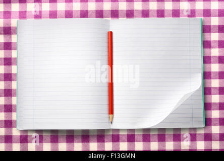 White blank open notebook with red pencil Stock Photo