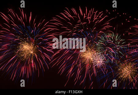 Brightly Colorful Fireworks in the Night Sky Stock Photo