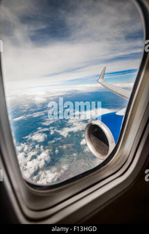 Classic image through aircraft window onto jet engine Stock Photo