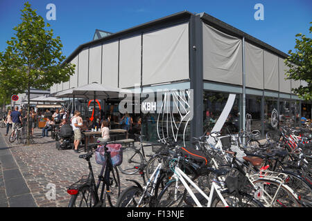 Torvehallerne, the covered food market at Israels Plads in Copenhagen on a sunny summer Saturday morning. Sunshades down. Stock Photo