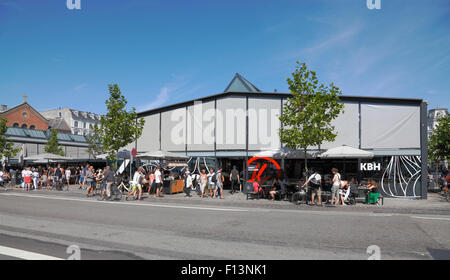 Torvehallerne, the covered food market at Israels Plads in Copenhagen on a sunny  summer Saturday morning. Sunshades down. Stock Photo