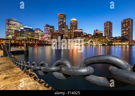 Boston skyline at dusk as viewed from Fan Pier Park. Stock Photo