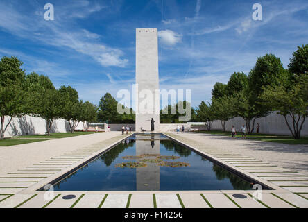 Entrance of the Netherlands American Cemetery and Memorial with a pond and memorial tower Stock Photo