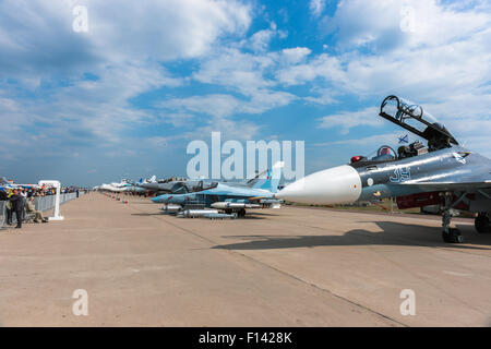 Moscow, Russia. 26th August, 2015. The Twelfth International Moscow Aerospace Show MAKS 2015 was opened in Zhukovsky city in the Moscow Region on August 25, 2015. The aim of the show is to demonstrate Russian aerospace achievements, make contracts and negotiate international projects. Static exposition of a military fighter planes on the airfield Credit:  Alex's Pictures/ Alamy Live News Stock Photo