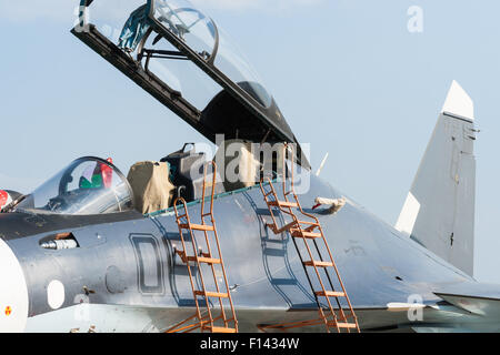 Moscow, Russia, Wednesday, August 26, 2015. The Twelfth International Moscow Aerospace Show MAKS 2015 was opened in Zhukovsky city in the Moscow Region on August 25, 2015. The aim of the show is to demonstrate Russian aerospace achievements, make contracts and negotiate international projects. Sukhoi fighter plane cockpit with a canopy opened. Credit:  Alex's Pictures/Alamy Live News Stock Photo