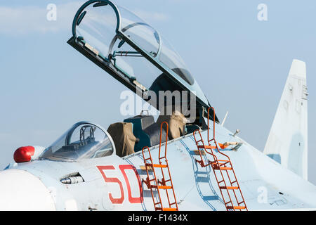 Moscow, Russia, Wednesday, August 26, 2015. The Twelfth International Moscow Aerospace Show MAKS 2015 was opened in Zhukovsky city in the Moscow Region on August 25, 2015. The aim of the show is to demonstrate Russian aerospace achievements, make contracts and negotiate international projects. Sukhoi fighter plane cockpit with a canopy opened. Credit:  Alex's Pictures/Alamy Live News Stock Photo