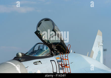 Moscow, Russia, Wednesday, August 26, 2015. The Twelfth International Moscow Aerospace Show MAKS 2015 was opened in Zhukovsky city in the Moscow Region on August 25, 2015. The aim of the show is to demonstrate Russian aerospace achievements, make contracts and negotiate international projects. Sukhoi fighter plane cockpit with a canopy opened. Credit:  Alex's Pictures/Alamy Live News Stock Photo