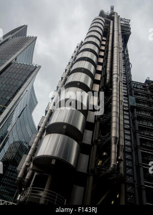 Grey skies over the Lloyds Building in the city of london financial district Stock Photo