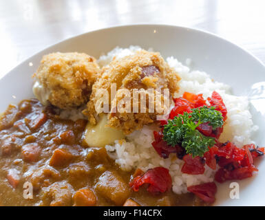 Curry with rice Japanese style on wooden table Stock Photo