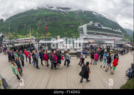 Passengers queuing to board tender boats to take them to the P&O cruise ship Azura, tendered in Geiranger, Norway Stock Photo