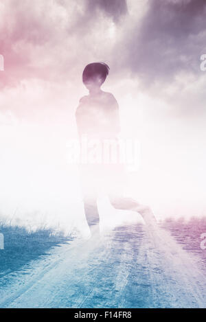 Woman Running to Freedom Through Countryside Field, Silhouette of Female Person, Double Exposure, Vintage Retro Tone Effect.