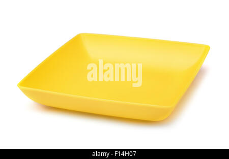 Yellow square plastic plate isolated on white Stock Photo