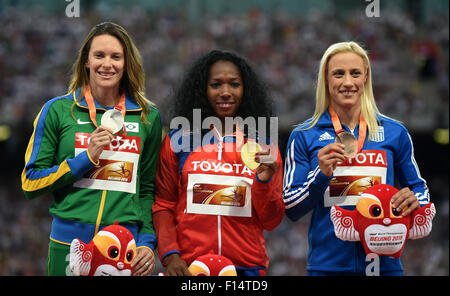 Beijing, China. 27th Aug, 2015. Gold medalist Cuba's Yarisley Silva (C), silver medalist Brazil's Fabiana Murer (L) and bronze medalist Greece's Nikoleta Kyriakopoulou celebrate during the women's pole vault awarding ceremony at the IAAF World Championships at the 'Bird's Nest' Naitonal Stadium in Beijing, capital of China, Aug. 27, 2015. Credit:  Li Wen/Xinhua/Alamy Live News Stock Photo