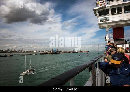 Passengers on a Red Funnel Isle of Wight Ferry sailing down The Solent, Hampshire, UK Stock Photo
