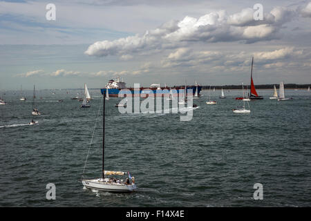Expensive racing yachts gather for the Rolex Fastnet Race at Cowes, Isle of Wight, UK Stock Photo