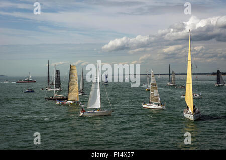 Expensive racing yachts gather for the Rolex Fastnet Race at Cowes, Isle of Wight, UK Stock Photo