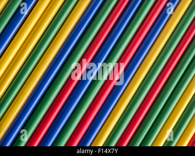 Colorful drinking straws arranged in diagonal straight lines Stock Photo