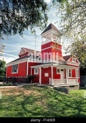 The historic little red Santa Clara School was built in 1896 and still serves elementary students in kindergarten through 6th grade in the rural area between Santa Paula and Fillmore, California, USA. The classic one-room schoolhouse is home for grades K-1 and school assemblies; two modular units were added on the school grounds in the 1990s to house the other grades. Today’s students enjoy air-conditioning and computers, as well as the old school bell that still rings from the towering belfry. Stock Photo