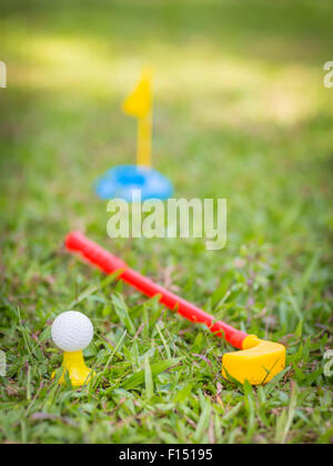 Plastic golf club and ball Stock Photo