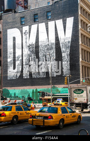 NEW YORK CITY, USA - MAY 17: 2008.Iconic DKNY Ad on Houston Street. The brick wall of the building bordering the lot has been us Stock Photo