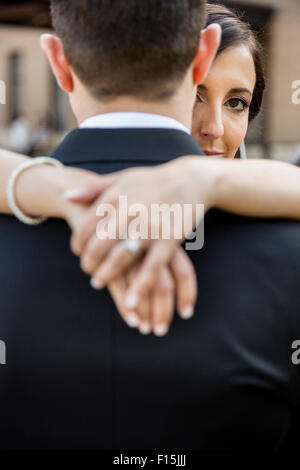 Portrait of Bride and Groom Hugging Outdoors, Hamilton, Ontario, Canada Stock Photo