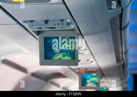 Overhead screens, vents and lights in Airbus 320 Stock Photo - Alamy