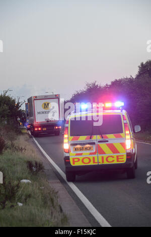 Bridgwater, UK. 27th August, 2015. Police have had to impose improvised road blocks on surrounding roads to house the ever increasing lorry car park in Bridgwater. Credit:  Michael Scott/Alamy Live News Stock Photo