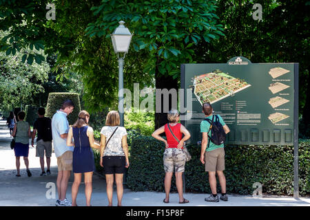Madrid Spain,Hispanic Retiro,Paseo del Prado,Real Jardin Botanico,Royal Botanical Garden,sign,map,man men male,Hispanic woman female women,couple,look Stock Photo