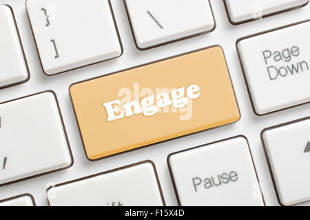 Brown engage key on keyboard Stock Photo