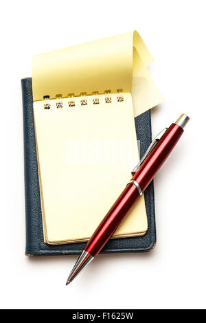 Note Pad Plus Red Yellow blank notepad open with red pen Stock Photo - Alamy
