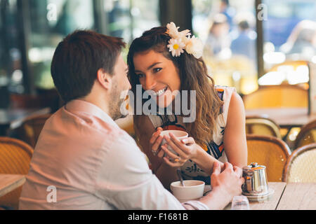 Couple dating in cafe, Paris Stock Photo