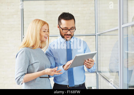Manager using modern technologies in work Stock Photo