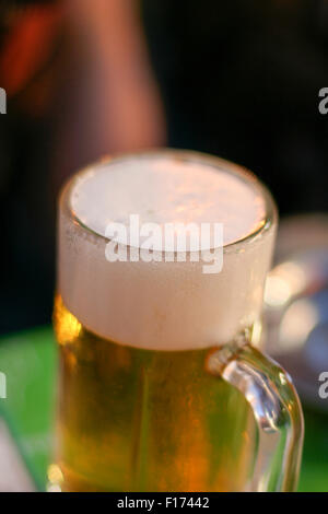 Glass of lager beer with froth foam head depth of field Stock Photo