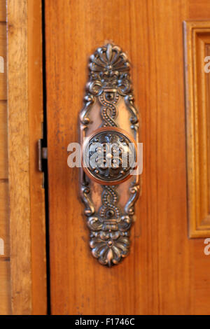 Ornate bronze doorknob handle close up Stock Photo