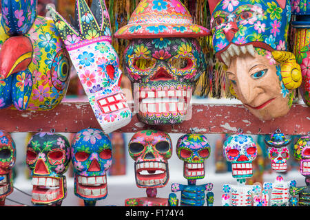 Mayan wooden masks for sale at Chichicastenango market in Guatemala. Stock Photo