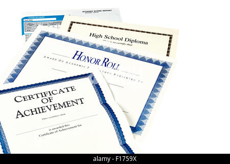 Education documents including SAT report, high school diploma, honor roll recognition, commencemnent program and certificate of  Stock Photo