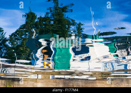 Abstract reflection of a boat in Pender Harbour on the Sunshine Coast of British Columbia Stock Photo