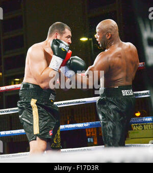 Las Vegas, Nevada, USA. 29th Aug, 2015. Heavyweight boxers Trevor Bryan and Derric Rossy engage each other during their NABF Heavyweight title bout as part of ''Heavyweight Extravaganza'' on August 28, 2015 at the Downtown Las Vegas Events Center in Las Vegas, Nevada Credit:  Marcel Thomas/ZUMA Wire/Alamy Live News Stock Photo