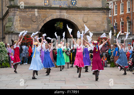 Shrewsbury Morris dance ladies dancing in front of the Old Market Hall during Shrewsbury Folk Festival, Shropshire, England, UK Stock Photo