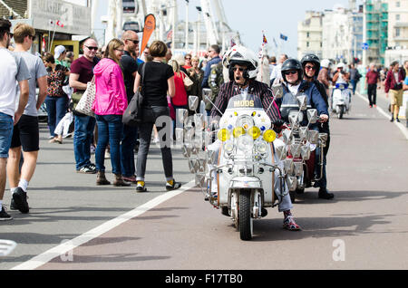 Brighton, England, UK. 29th August 2015. Day 2 of the Brighton Modernist and 60s Weekender. Hoards of riders have arrived on Brighton seafront to show off their customised scooters during the Bank Holiday weekend. The event runs from 28 – 30 August 2015. Credit:  Francesca Moore/Alamy Live News Stock Photo